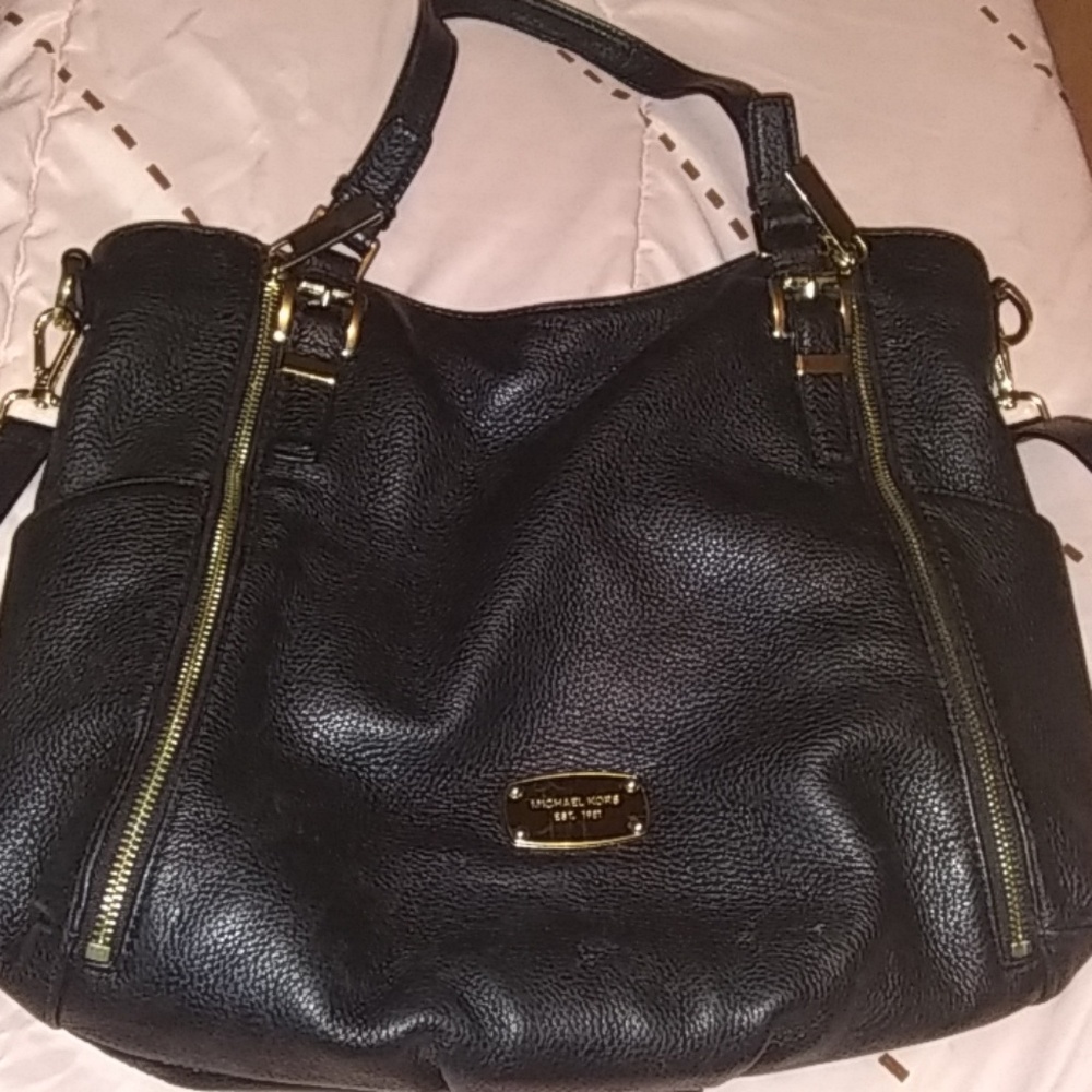 Off the shoulder black Michael kors handbag